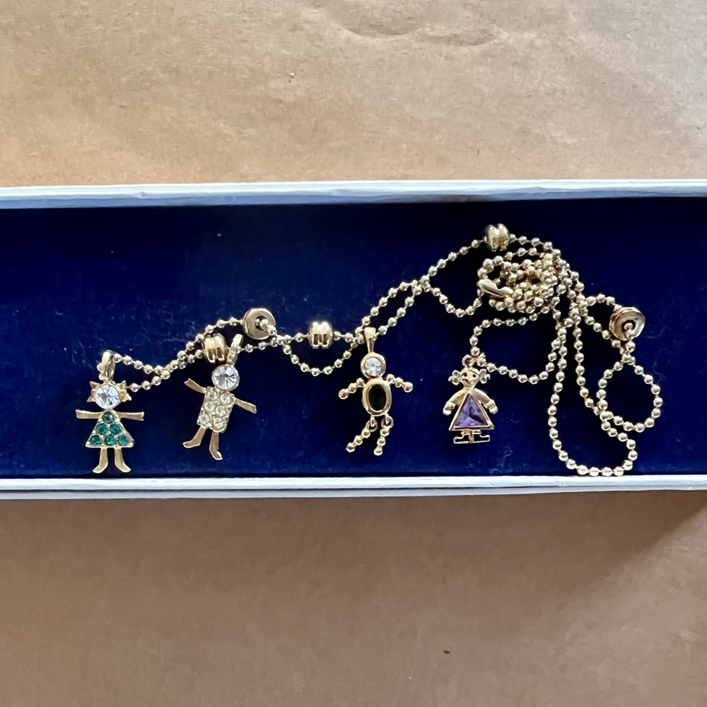 Birthstone Brats necklace featuring 4 kid birthstone charms